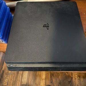 PlayStation 4 (12games) (2controllers) along with steering wheel and pedals.